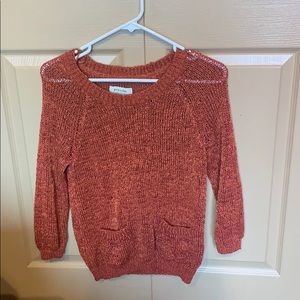 Small orange sweater